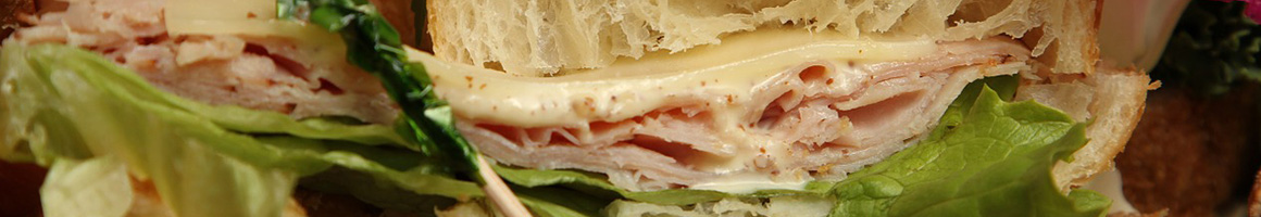 Eating Deli Sandwich at Family Deli restaurant in Bethel Park, PA.